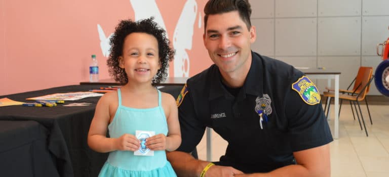 Salem Police Officer Attends Back to School Toddler Tuesday Event at the Mall at Rockingham Park